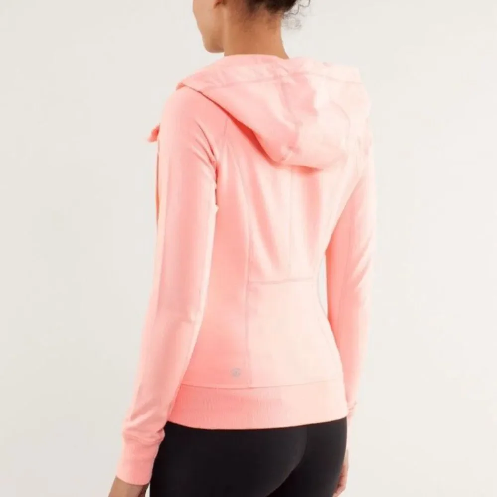 Lululemon Rejuvenate Hoodie size 8 Bleached Coral has a spot
